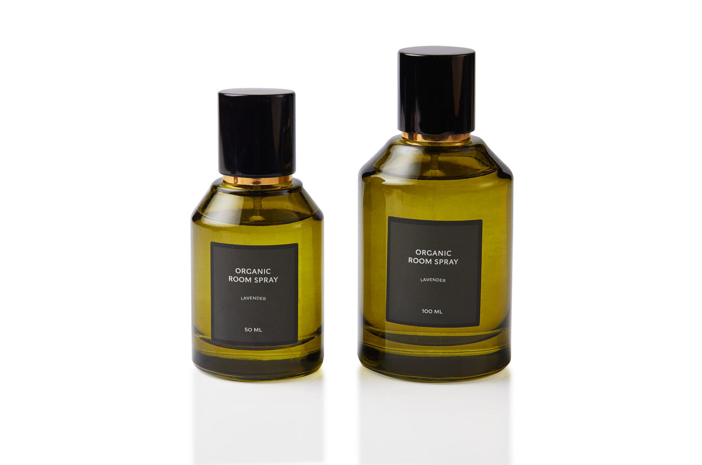 Two sizes of Artisan of Sense botanical body and room mist in olive green glass, each with a sleek black spray cap. Alcohol-free, phthalate-free natural fragrance handcrafted in Singapore for refreshing skin, linens, and living spaces without synthetic ingredients.