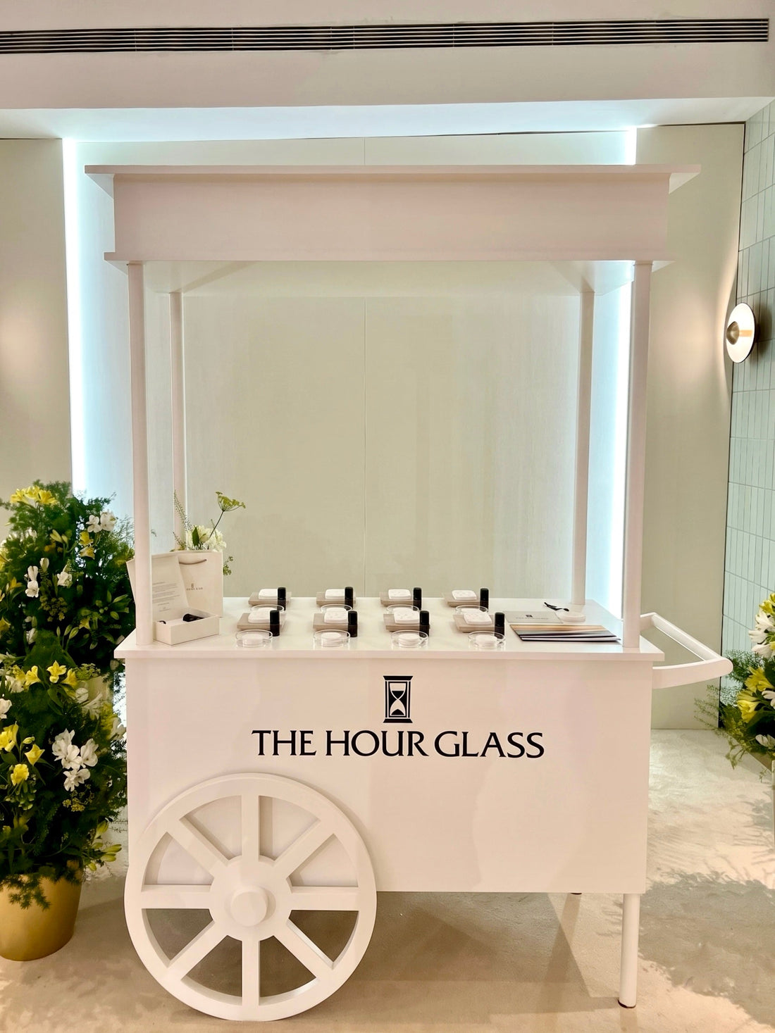 The Alchemist's Atelier VIP fragrance bar cart custom-branded for The Hour Glass luxury corporate event activation by Artisan of Sense Singapore.