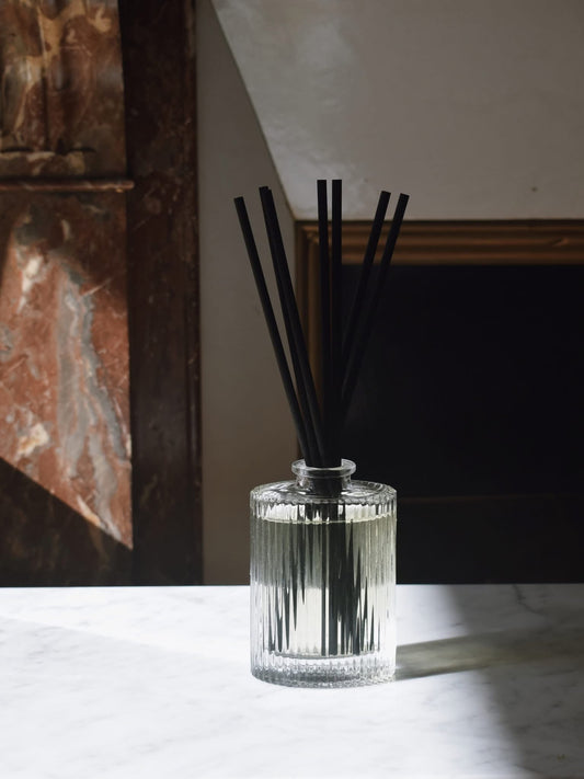 Artisan of Sense handcrafted luxury reed diffuser with natural botanical essential oils on marble, bespoke corporate gifting Singapore