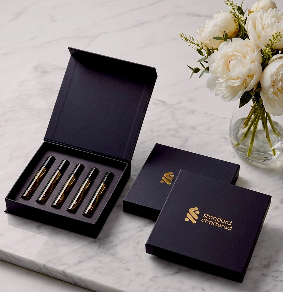 Custom luxury corporate gift set with botanical mists, reed diffusers, and soy candles crafted for Standard Chartered by Artisan of Sense Singapore.