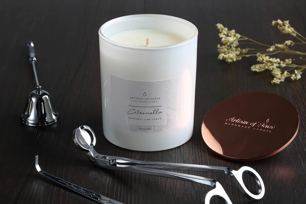 Classically designed wick trimmer, wick dipper, and bell snuffer in Rose Gold or Silver, for elegant candle care.