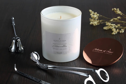 Classically designed wick trimmer, wick dipper, and bell snuffer in Rose Gold or Silver, for elegant candle care.