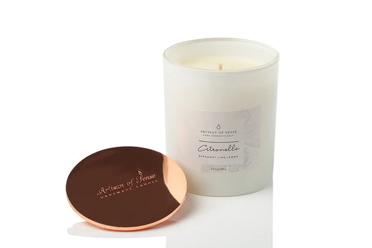 Artisan soy candle infused with natural Citronella, Bergamot, Lime & Lemon, cotton wick, inside sustainable packaging.