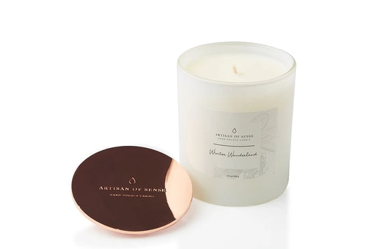 Soy candle with natural Winter Wonderland Soy Candle, cotton wick, made in Singapore, in a classic pink box.
