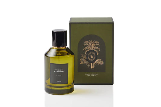 Botanical body and room mist in elegant olive green glass with a black cap and gold spray accent, infused with true French Lavender. Alcohol-free dual-purpose plant-based spray handcrafted in Singapore to calm the mind, refresh bed linens, and settle interiors before sleep.