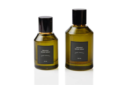 Orange and Grapefruit botanical body and room mist in two olive green glass bottle sizes with sleek black caps. Plant-based, phthalate-free fragrance blended at the Artisan of Sense Joo Chiat atelier, delivering sunlit citrus lift to skin, linens, and everyday living spaces.