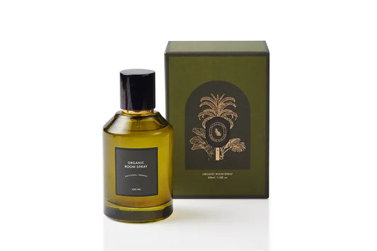 Botanical body and room mist in an elegant olive green glass bottle with sleek black cap and gold spray accent, blending earthy Patchouli with sweet Orange peel. Alcohol-free, plant-based spray handcrafted at the Artisan of Sense Joo Chiat atelier to refresh skin, linens, and grounded interior spaces.