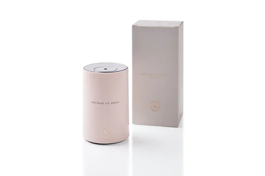 Portable ultrasonic diffuser set in Pink, White, or Black, includes AOS Essential Oil Blend for on-the-go aromatherapy.
