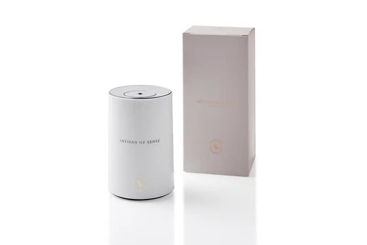 Portable ultrasonic diffuser set in Pink, White, or Black, includes AOS Essential Oil Blend for on-the-go aromatherapy.